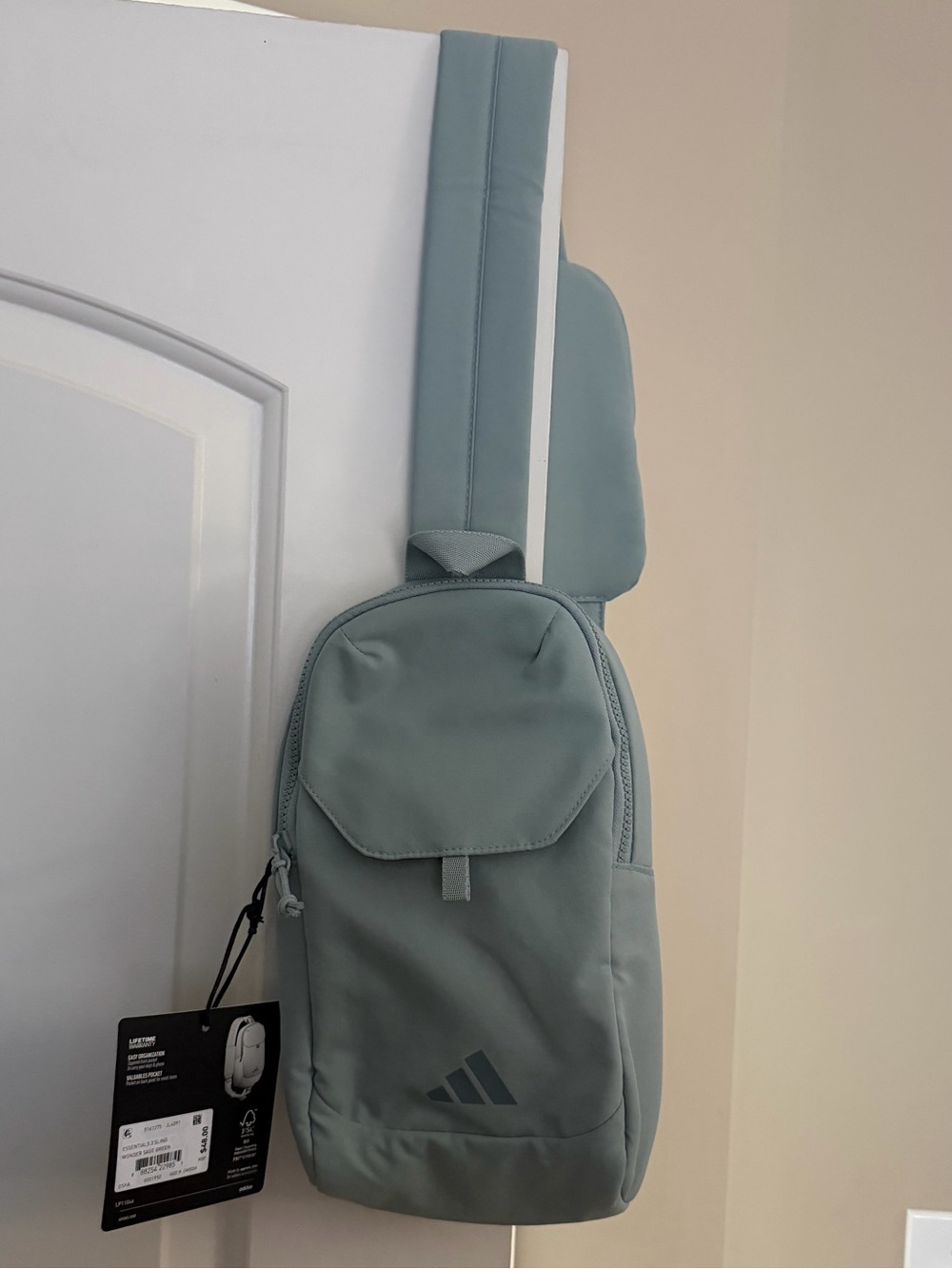 Brand new”Adidas UNISEX”crossbody bag.SizeWide-9”x13”inc,color-wonder sage green